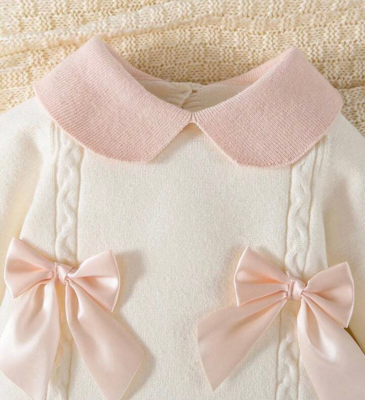 Girls clothing two bow baby grow