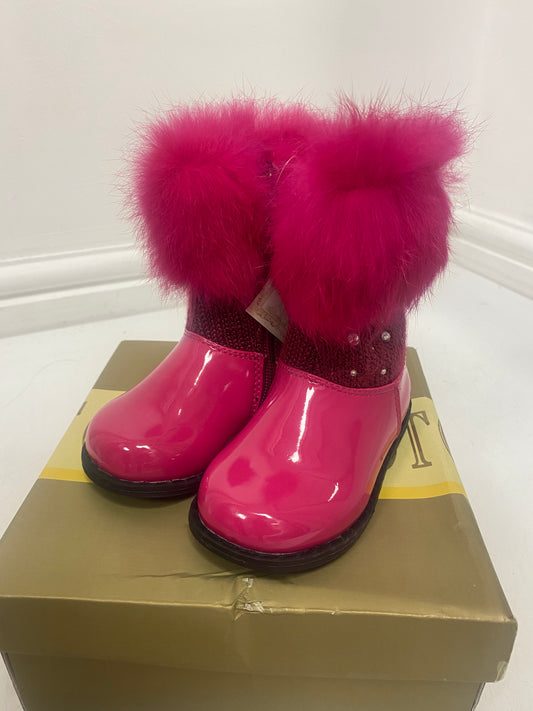 Bright pink faux fur top boots